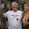 Estoy bien gracias T-Shirt — Dark Humor Spanish Phrase Tee with Blood Splatter